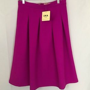 Magenta pique skirt size large. New with tags!